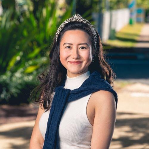 photo of Denyse wong standing in front of a tree. Financial planning associate