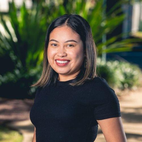 photo of Mary Ann Almasan standing in front of a tree. Financial planner (provisional)
